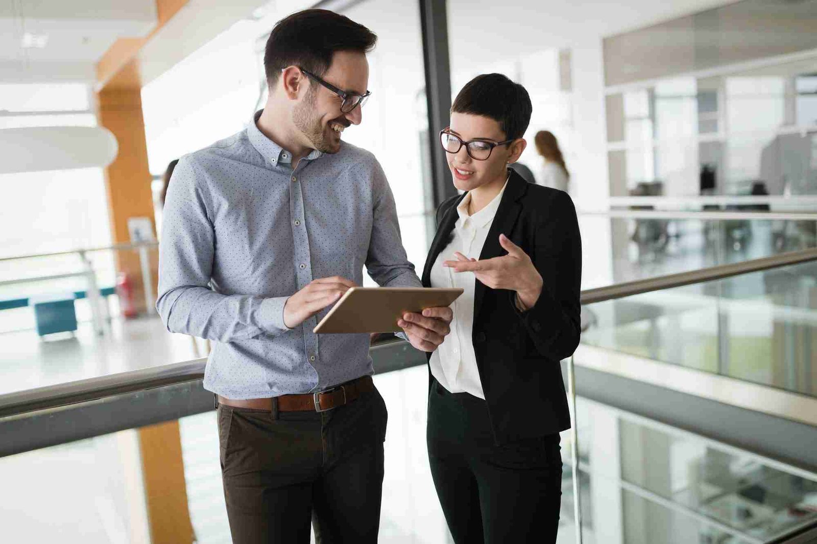 Corporate teamworking young colleagues in modern office